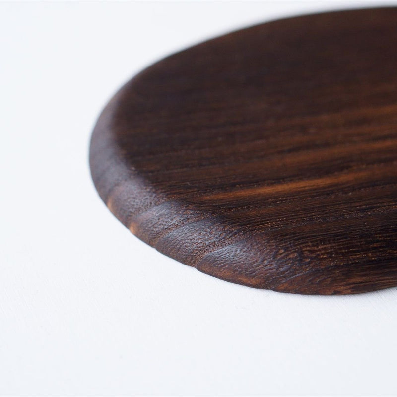 Board made of baked paulownia wood